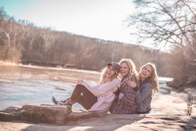Letter of invitation in Spain three girls laughing
