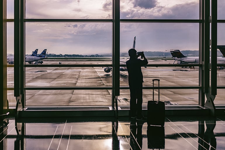 airports in spain person taking a photo