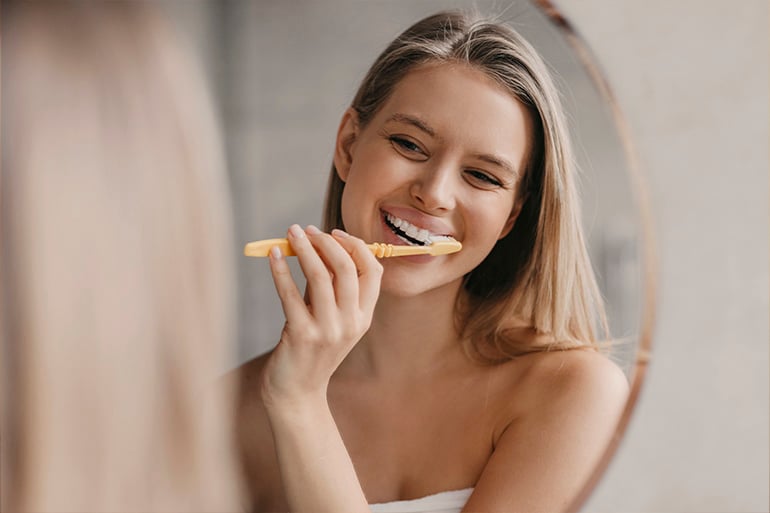 Dentures vs implants: everything you need to know
