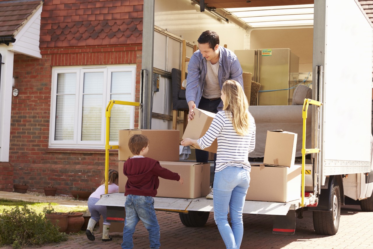 if you're moving to live in spain, you'll need help unpacking boxes like this family