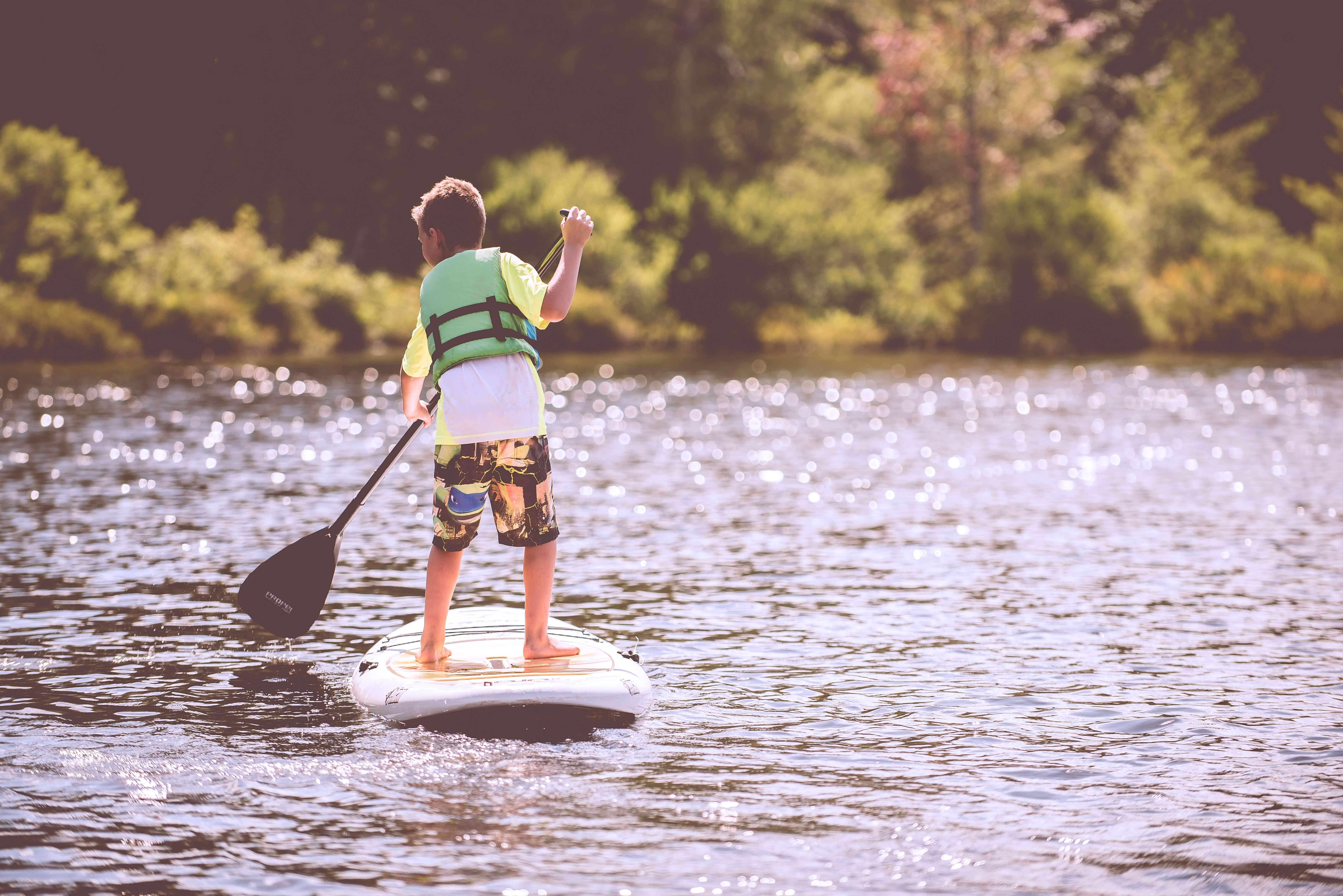 paddleboard is another summer thing to do in spain with kids