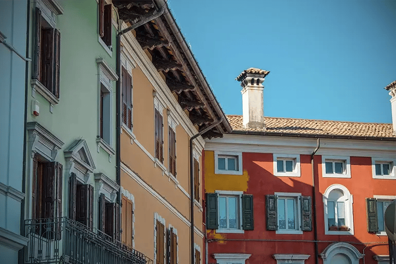 houses of different colours such as green, orange or red