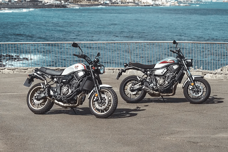 two motorcycles by the sea