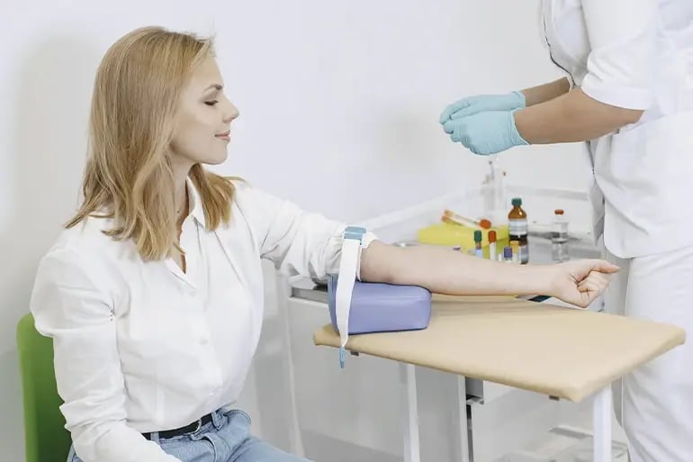 a woman having a blood test