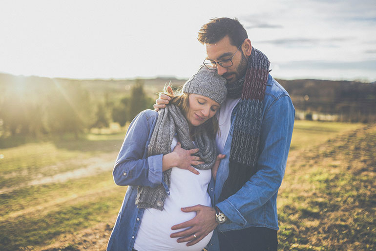 couple expecting a child thanks to infertility treatments