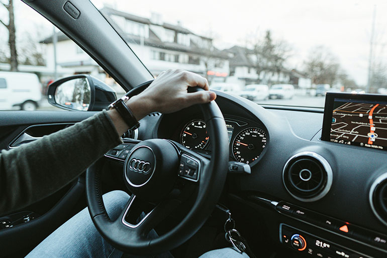 Man driving thinking about car breakdown cover in Spain