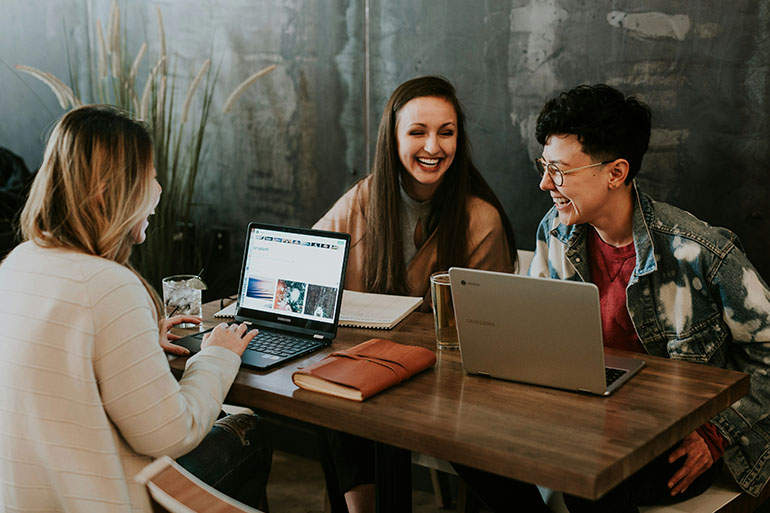 friends happy about international student insurance
