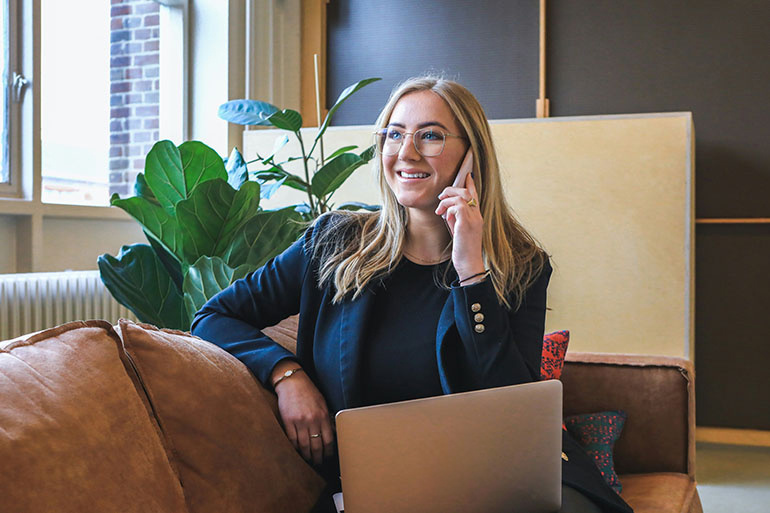 woman confirming her business health insurance