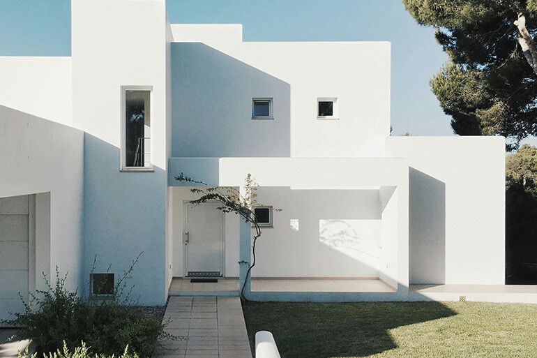 white home with weather insurance
