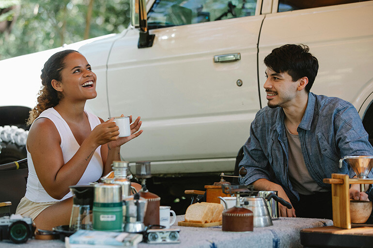 couple talking about needing supplemental liability insurance when renting a car
