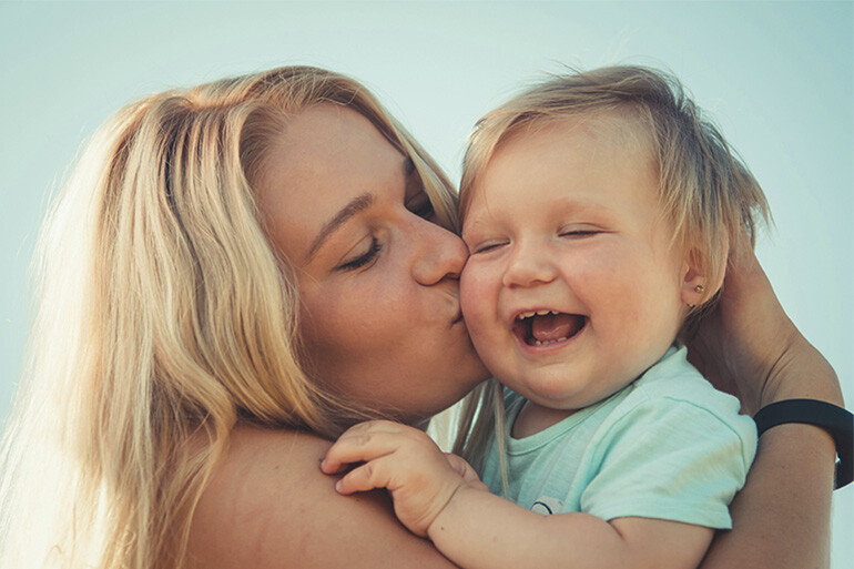 A mother with her baby after a fertility treatment.