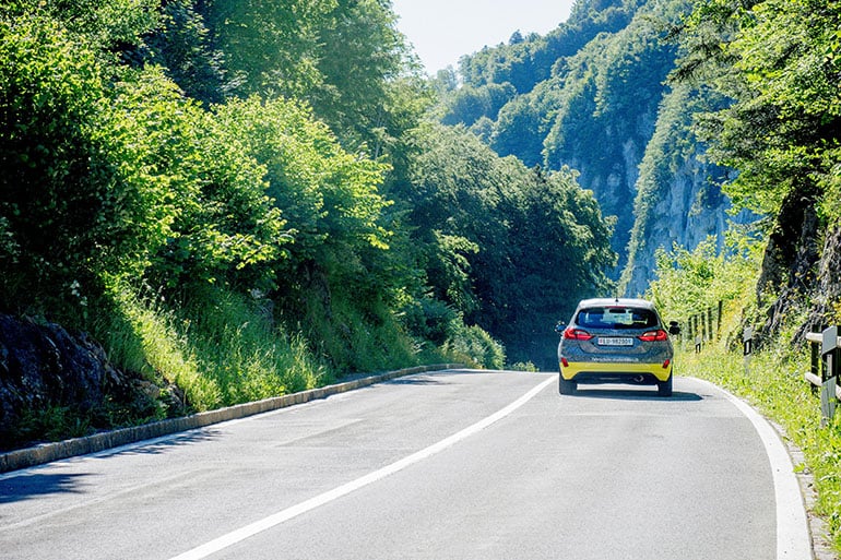 A travel car that has auto insurance covering hit-and-run accidents.