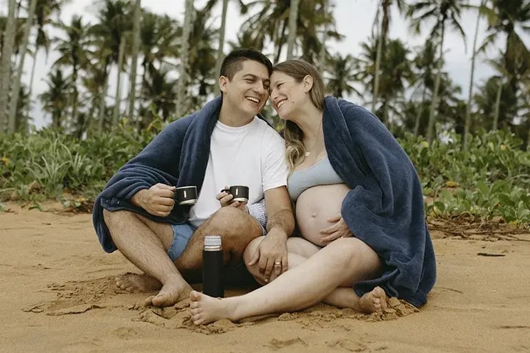 A couple enjoying their trip after purchasing their travel insurance and pregnancy coverage.