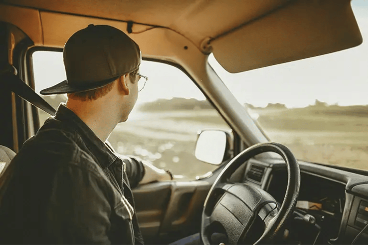A guy driving after finding out how to change your driving license in Spain