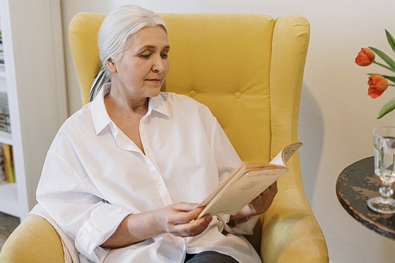 A woman researching if pensioners have to pay for prescriptions.