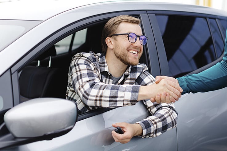 A man after buying a used car in Spain.