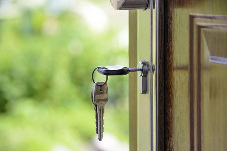 Opening their new home after obtaining the residence permit to buy a property in Spain