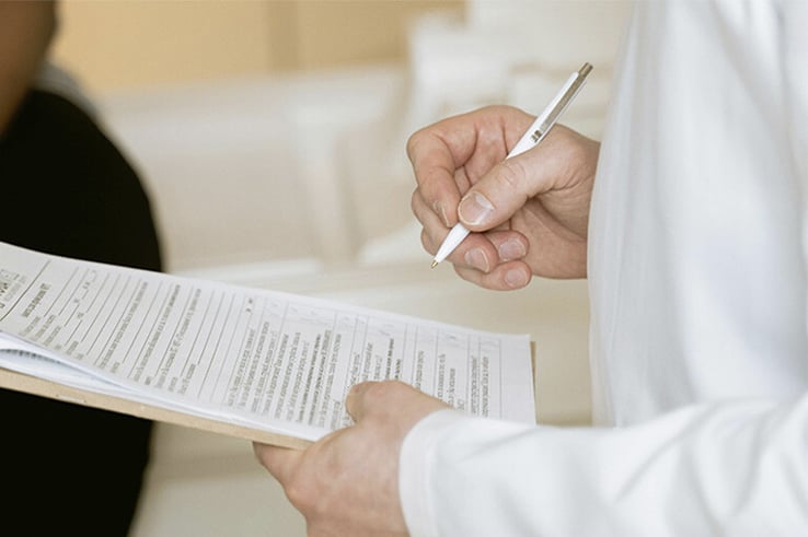 A person renewing her European Health Insurance Card in Spain.