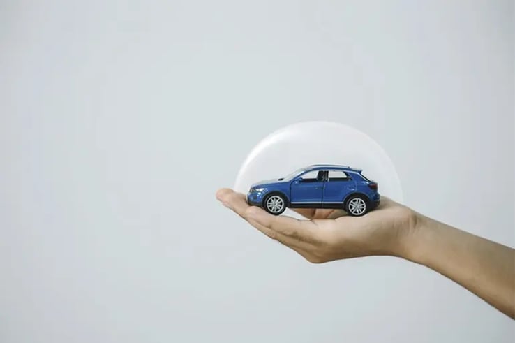 A car protected with its green card car insurance.