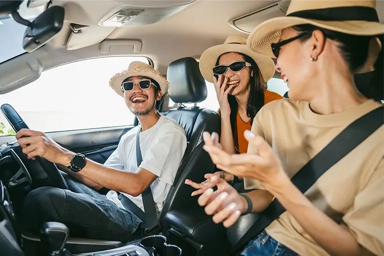  A group of friends traveling peacefully because the car has green card car insurance.