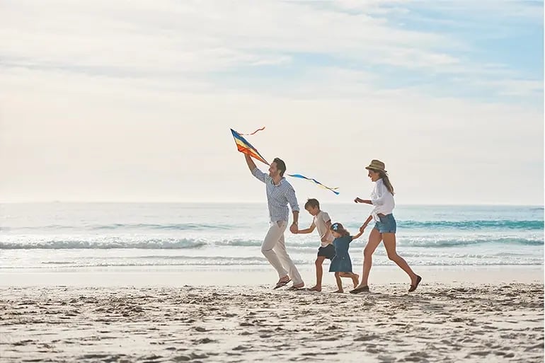 A family after purchasing holiday insurance in Spain.