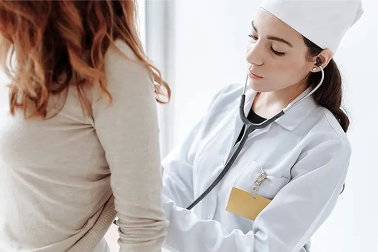 A woman getting examined to prevent suffering from some of the most common health problems.