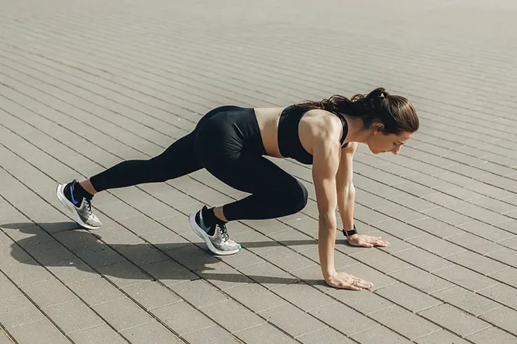A woman after knowing the 4 reasons to go to physical therapy for an injury.
