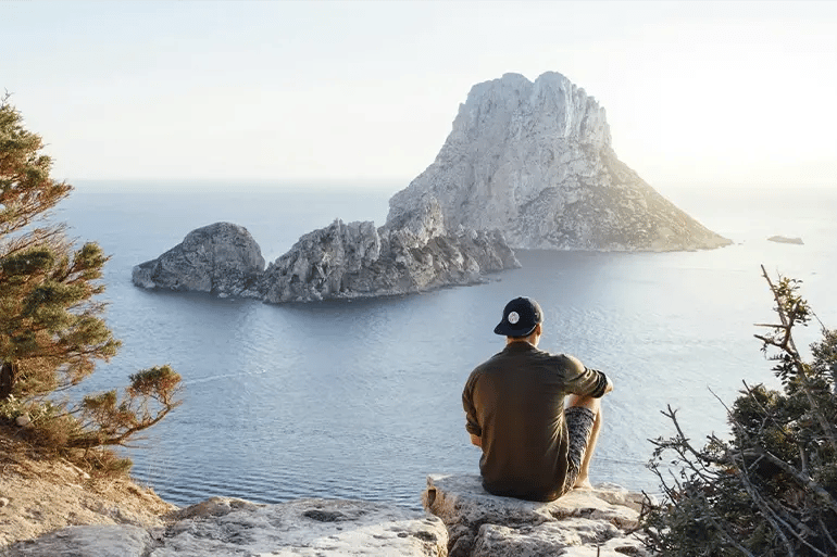 A young man enjoying his solo trip after taking out his Health travel insurance for europe