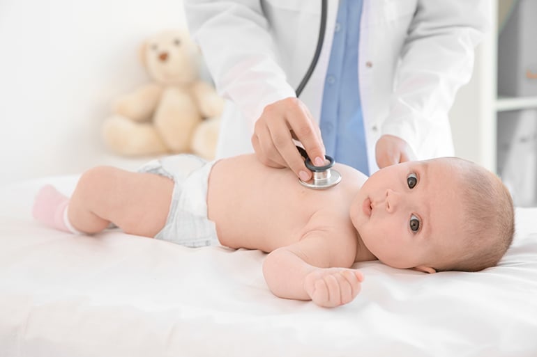 flu vaccine for babies in Spain. baby at the doctor