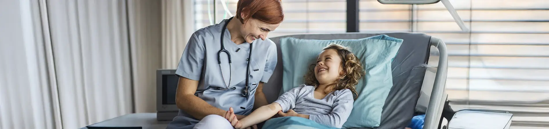 a doctor treating a girl on a stretcher