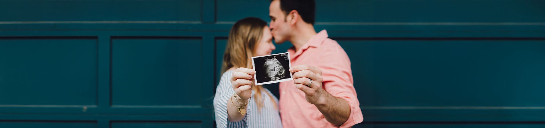 Couple expecting a child after exploring the difference between in vitro fertilization and artificial insemination