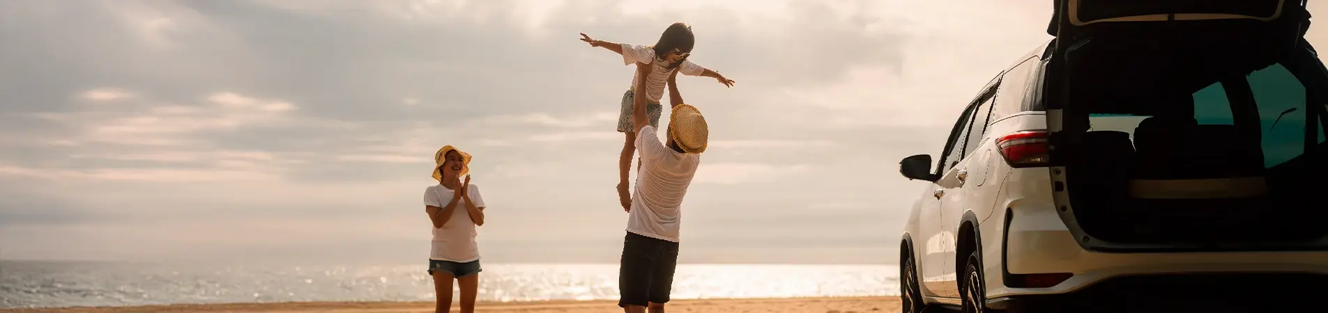 A family enjoying their trip with the best car insurance in Spain for the Balearic Islands.